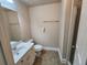 Bathroom includes a single vanity, toilet, and tiled shower at 10856 Ellicot Way, Alpharetta, GA 30022