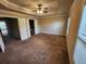 Bedroom featuring neutral colors, crown molding, carpet, and windows at 10856 Ellicot Way, Alpharetta, GA 30022