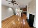 Open concept living space with hardwood floors, recessed lighting, and a kitchen island at 10856 Ellicot Way, Alpharetta, GA 30022
