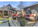 Inviting backyard deck area with comfortable seating, outdoor decor, and manicured landscaping, perfect for relaxation at 1402 Sw Belmont Sw Ave, Atlanta, GA 30310