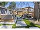 Inviting backyard featuring an outdoor lounge area, pergola, and lush landscaping at 1402 Sw Belmont Sw Ave, Atlanta, GA 30310