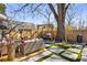 Stunning backyard with a variety of outdoor seating options, lush landscaping, and a perfect relaxation atmosphere at 1402 Sw Belmont Sw Ave, Atlanta, GA 30310
