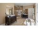 Luxurious bathroom with a glass shower, dual vanities, a soaking tub and natural light at 1402 Sw Belmont Sw Ave, Atlanta, GA 30310