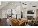 Comfortable living area with vaulted ceilings, entertainment center, and stylish furnishings at 1402 Sw Belmont Sw Ave, Atlanta, GA 30310