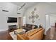 Spacious living room with vaulted ceilings, hardwood floors, and modern decor at 1402 Sw Belmont Sw Ave, Atlanta, GA 30310