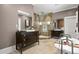 Luxurious main bathroom featuring dual vanities, a soaking tub, and a glass-enclosed shower at 1402 Sw Belmont Sw Ave, Atlanta, GA 30310
