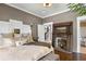 Cozy main bedroom with decorative fireplace and ensuite bathroom at 1402 Sw Belmont Sw Ave, Atlanta, GA 30310