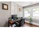 Cozy office space with natural light, wooden desk, and view of the outdoors at 1402 Sw Belmont Sw Ave, Atlanta, GA 30310