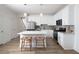 Modern kitchen with white cabinets, stainless steel appliances, and a center island with barstool seating at 1724 Gunnin Nw Trce # 232, Atlanta, GA 30318