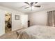 Bright bedroom boasts neutral carpet, walk in closet, and en suite bathroom at 1824 Mcclung Rd, Hiram, GA 30141