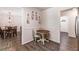 Breakfast nook features wood-look floors, wainscotting, and views into the entry and main living spaces at 1824 Mcclung Rd, Hiram, GA 30141