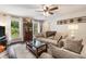 Comfortable living room offering views to the backyard, neutral tones, and stylish decor, creating a relaxing ambiance at 1824 Mcclung Rd, Hiram, GA 30141