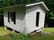 View of white storage building with dark shutters at 215 N Etowah Ct, Canton, GA 30114