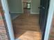 Inviting foyer with gleaming hardwood floors leading to a bright, open space at 215 N Etowah Ct, Canton, GA 30114