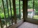 View from a bright sun room, looks out to shed at 215 N Etowah Ct, Canton, GA 30114