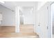 Bright foyer with light wood floors, fresh white walls, and a view of the front door at 3314 Dilmus Dr, Powder Springs, GA 30127