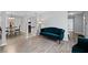 Spacious living room with an open floor plan, connecting the living area to the dining area, perfect for socializing at 100 Fairview Dr, Stockbridge, GA 30281