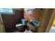 This bathroom needs a total overhaul, with peeling paint and outdated fixtures at 1182 Bronx Nw St, Atlanta, GA 30314