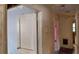 The hallway features damaged walls and flooring connecting rooms at 1182 Bronx Nw St, Atlanta, GA 30314