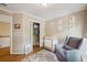 Charming Bedroom with a cozy rocking chair, crib, and closet, perfect for a new baby at 2078 Marshalls Se Ln, Atlanta, GA 30316