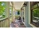 Charming covered front porch with outdoor seating at 2078 Marshalls Se Ln, Atlanta, GA 30316