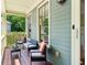 Inviting front porch with seating, ideal for relaxing and enjoying the outdoor views and neighborhood at 2078 Marshalls Se Ln, Atlanta, GA 30316