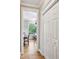 Hallway with closet and view into dining room at 2078 Marshalls Se Ln, Atlanta, GA 30316