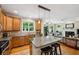 Bright kitchen with island, stainless appliances, open to living room at 2078 Marshalls Se Ln, Atlanta, GA 30316