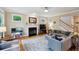 Cozy living room with fireplace and neutral decor at 2078 Marshalls Se Ln, Atlanta, GA 30316
