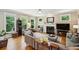 Bright living room with fireplace, hardwood floors, and large windows at 2078 Marshalls Se Ln, Atlanta, GA 30316