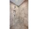 Shower stall with textured tiles and a built-in niche for toiletries at 2078 Marshalls Se Ln, Atlanta, GA 30316