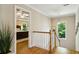 Staircase with hardwood floors leading to a bedroom with trey ceilings at 2078 Marshalls Se Ln, Atlanta, GA 30316
