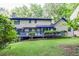 Lush backyard with lawn and patio offer an ideal space for outdoor relaxation and entertainment at 4953 Mcpherson Ne Dr, Roswell, GA 30075