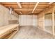Unfinished basement featuring a concrete floor, wooden support beams, and exposed ductwork at 4953 Mcpherson Ne Dr, Roswell, GA 30075