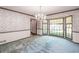 Dining room features decorative wallpaper, chair rail, and bay window at 4953 Mcpherson Ne Dr, Roswell, GA 30075