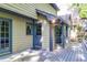 Outdoor living area with a wooden deck and access to the home's exterior at 4953 Mcpherson Ne Dr, Roswell, GA 30075
