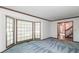 Bright living room with bay window, neutral walls, and wood trim at 4953 Mcpherson Ne Dr, Roswell, GA 30075