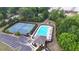 Aerial view showcases the community pool, tennis courts, playground, and parking, perfect for active lifestyles at 7455 Easton Valley Ln, Cumming, GA 30028