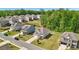 Charming two-story home with a well-manicured lawn in a desirable neighborhood with mature trees in the background at 7455 Easton Valley Ln, Cumming, GA 30028