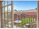 Balcony with a table and chairs with a view of the building at 1055 Piedmont Ne Ave # 409, Atlanta, GA 30309