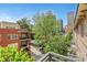 Balcony overlooking greenery, trees, and the city skyline at 1055 Piedmont Ne Ave # 409, Atlanta, GA 30309