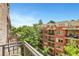 Balcony with a view of the surrounding residences and greenery at 1055 Piedmont Ne Ave # 409, Atlanta, GA 30309