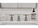 Bathroom with a marble countertop, modern fixtures, and designer hand soap at 1055 Piedmont Ne Ave # 409, Atlanta, GA 30309