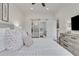 Serene bedroom features a sliding barn door leading to the bathroom at 1055 Piedmont Ne Ave # 409, Atlanta, GA 30309