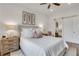 Bright bedroom showcases a sliding barn door, decorative wall art, and comfortable furniture at 1055 Piedmont Ne Ave # 409, Atlanta, GA 30309