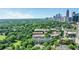 Scenic aerial view showcasing the community, surrounding greenery, and the city skyline at 1055 Piedmont Ne Ave # 409, Atlanta, GA 30309