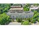 Aerial view of the beautiful condo building surrounded by lush greenery at 1055 Piedmont Ne Ave # 409, Atlanta, GA 30309