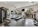 Well-equipped fitness center featuring treadmills, weights, and mirrored walls at 1055 Piedmont Ne Ave # 409, Atlanta, GA 30309
