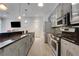 Well-equipped kitchen area featuring stainless steel appliances and modern cabinetry at 1055 Piedmont Ne Ave # 409, Atlanta, GA 30309