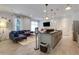 Community space with an open-concept kitchen, comfortable couch, and modern amenities at 1055 Piedmont Ne Ave # 409, Atlanta, GA 30309